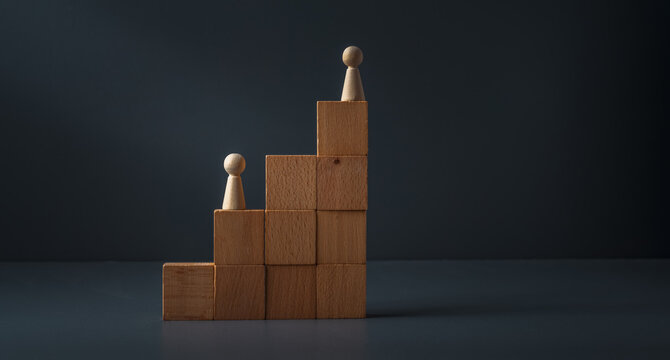 concept of competition in the workplace . Human rights, equal opportunity and overcoming adversity. Leadership in the workplace.on grey blue background .