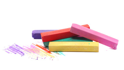 Colorful chalks pile with scribbles isolated on white, side view - obrazy, fototapety, plakaty