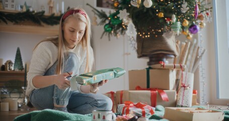 Woman Packing Christmas Gifts Christmas Tree