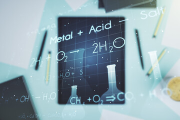 Double exposure of creative chemistry concept and digital tablet on background, top view, research...