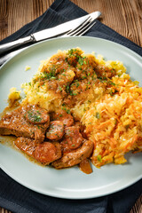 Stewed turkey meat with chorizo sausage.