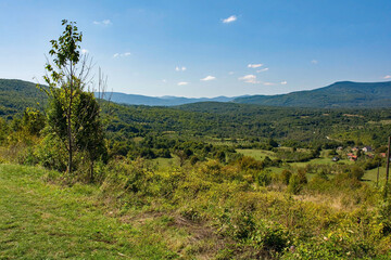 Fototapeta na wymiar The summer landscape around Ostrovica Castle overlooking Kulen Vakuf village in the Una National Park. Una-Sana Canton, Federation of Bosnia and Herzegovina
