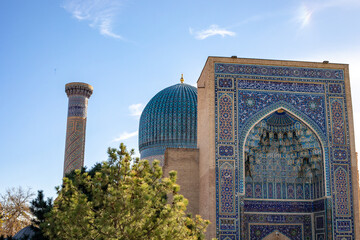 beautiful view of a building which built in old time, Amir Temur Mausoleum, madrasah, Samarkand, autumn.