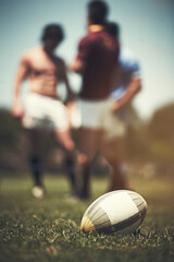 Rugby, teamwork and sports with ball on grass field for training, competition practice and challenge. Health, start and games with people on outdoor pitch for stadium, performance and fitness