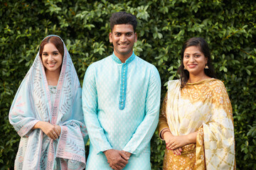 Group of positive Indian people traditional costumes attending party