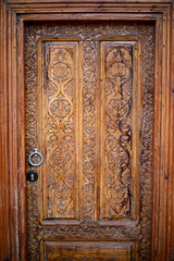 beautiful wooden carving with a ring shaped door knob, Khiva, the Khoresm agricultural oasis, Citadel.