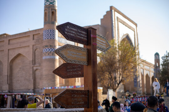 a guiding board in the middle of a historical place, Khiva, the Khoresm agricultural oasis, Citadel.