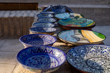 beautiful artwork in a plates and historical Street side, Khiva, the Khoresm agricultural oasis, Citadel.