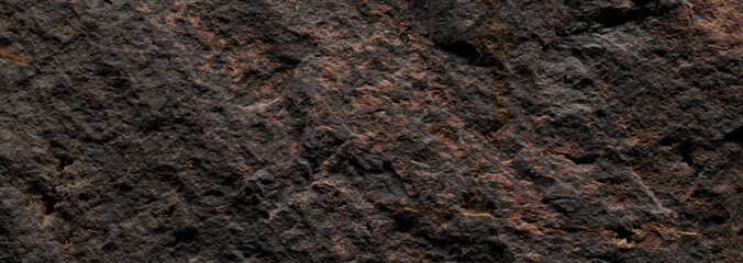 Brown stone texture, dark abstract background. Natural mineral rock close up details, empty backdrop with copy space for design
