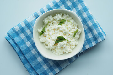 fresh paneer in a bowl on a table 