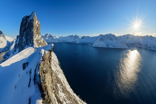 Norway, Troms og Finnmark, View of Segla mountain and surrounding fjord at sunrise