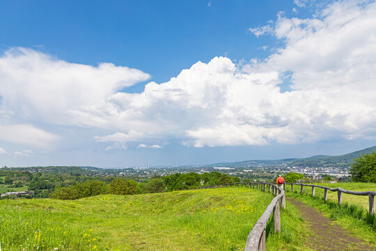 Germany, Rhineland-Palatinate, Clouds over trail on extinct Rodderberg volcano in summer