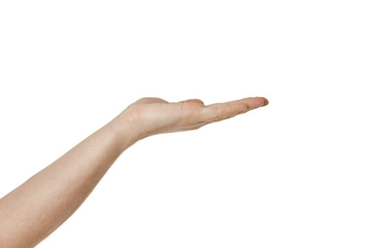 male hand holding something with empty palms up on white background