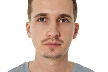 Fototapeta premium portrait of young calm man on white background