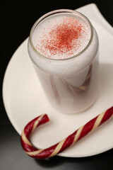 Peppermint Candy Cane Ice Milkshake. Christmas sweet cold drink