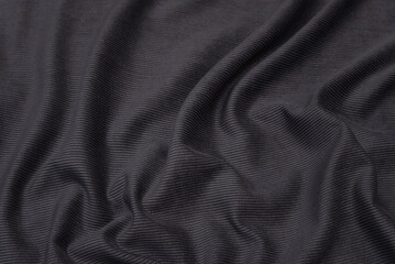 Abstract background texture of natural black color fabric. Fabric texture of natural cotton or...