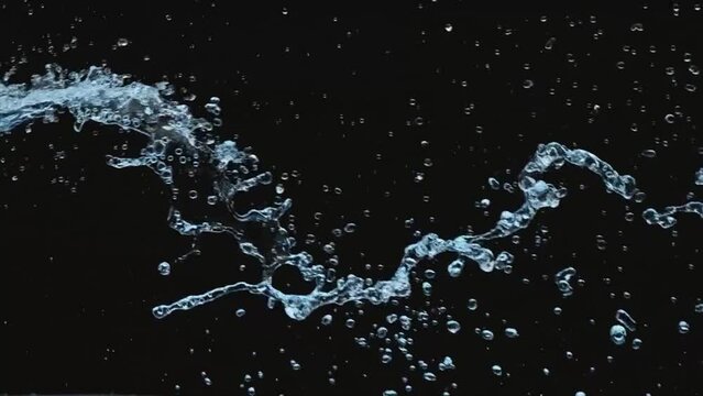 flying water jet in black background