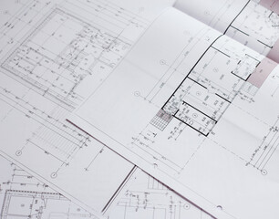 pencil and office tools for writing on the blueprint of construction industry. Place the rolls on a...