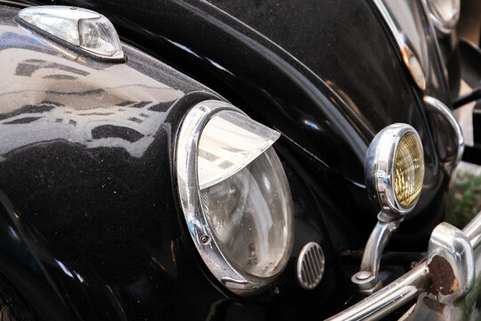Headlights of an old timer car. Close up photo