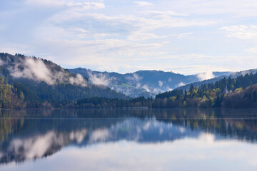 clouds over a lake in the morning