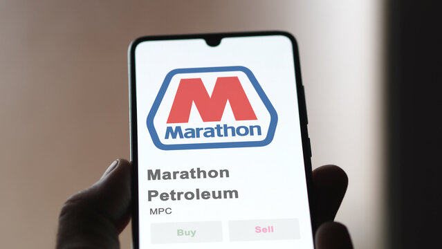 The logo of Marathon Petroleum on the screen of an exchange. Marathon Petroleum price stocks, $MPC on a device.
