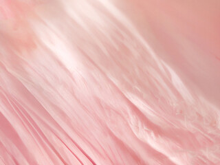 淡くレトロな色合いのピンク色の布背景