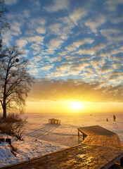 Fototapeta na wymiar Winter Sunset at the Frozen Lake