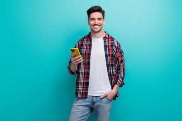Photo of cheerful funny guy wear checkered shirt communicating instagram twitter telegram facebook...