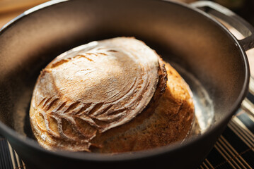 Ready baked bread in pan. Just baked homemade bread from the oven