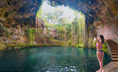 Ik-Kil Cenote - Lovely cenote in Yucatan Peninsulla with transparent waters and hanging roots....