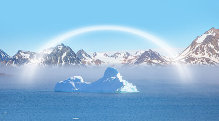 White rainbow over Arctic sea with floating ice - Greenland
