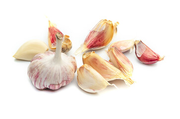 Fresh garlic with many segments isolated on white background with clipping path. Garlic cloves.