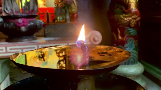 Flames under candlelight for worshiping sacred objects according to beliefs and culture in each country Region or religion, Flames under candlelight for worshiping gods, burning candle on background