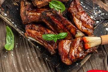Grilled and smoked ribs with sauce. Healthy dinner or lunch