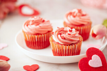Red velvet cupcakes with whipped cream for Valentine's day