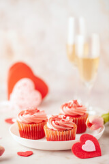 Red velvet cupcakes with whipped cream for Valentine's day