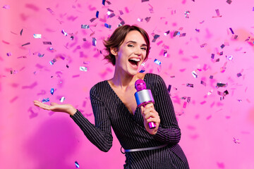 Photo of dreamy charming girl dressed glamour clothes signing karaoke isolated pink color background