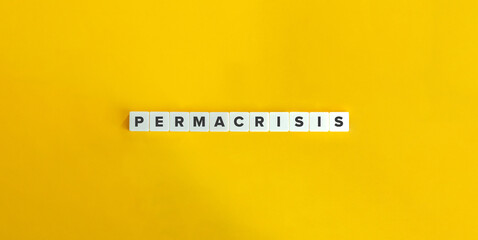Permacrisis Word on Block Letter Tiles on Yellow Background. Minimal Aesthetics.