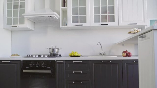 Ready kitchen - reconstruction completed. Black stylish new kitchen. Full kitchen and countertop.