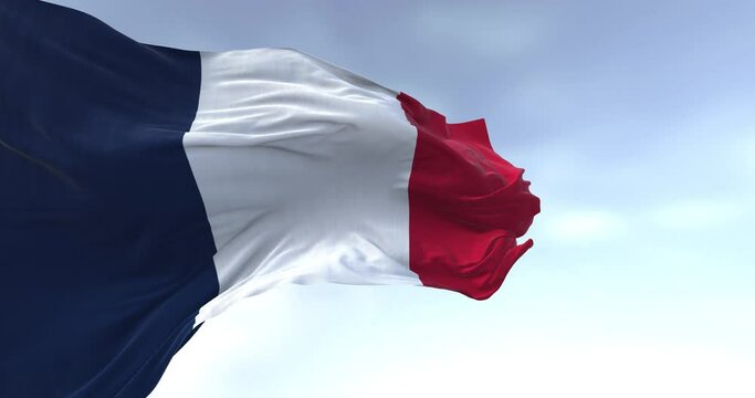 Close-up of national flag of France waving on a clear day