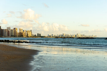 At the Beach of Candeias early in the morning, just after sunrise. The City of Recife, Brazil is to...