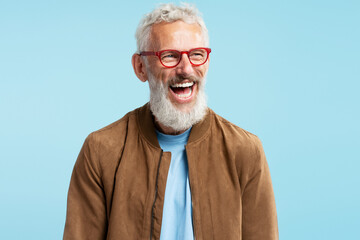Authentic portrait handsome happy middle aged gray haired man wearing stylish red hipster...