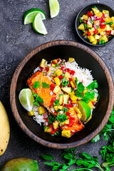 Grilled salmon with mango salsa and rice.top veiw