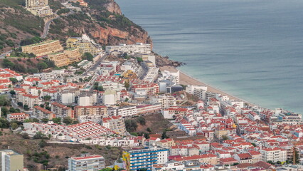 Aerial view of the coastline of the village of Sesimbra timelapse. Portugal