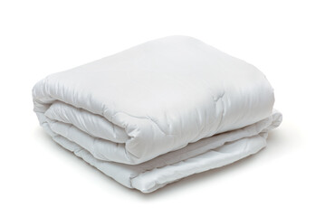 Folded white soft quilt blanket