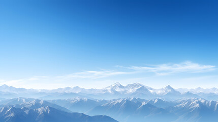 Fototapeta na wymiar Majestic mountain range under a clear blue sky.