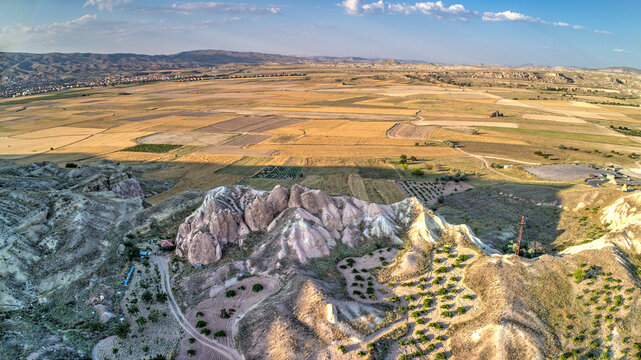 Panoramic view of fairy chimneys in Goreme Historical National Park. Goreme National Park and Rock Sites of Cappadocia, Central Anatolia, Nevsehir Province, Turkey. drone view. Ariel from above, top