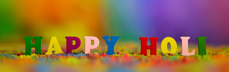 Happy Holi. Colorful background of multicolored gulal powder paints. A colorful festival of colored...