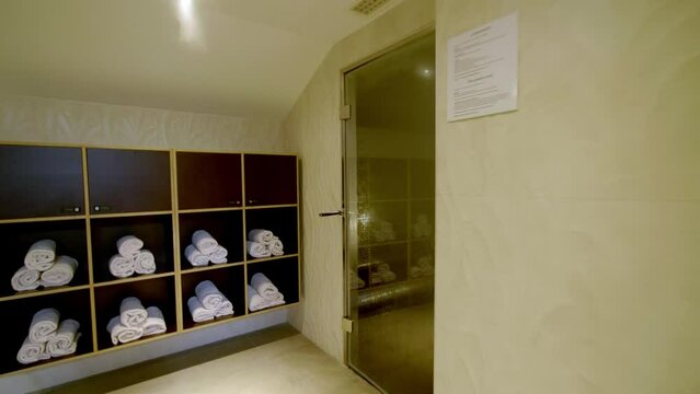 Towel cubby at a serene wellness center.