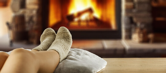 Woman legs and warm socks. Free spce for your decoration. 